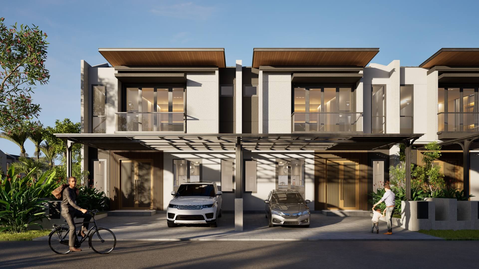 Row of contemporary townhouses with glass balconies and a shared carport; two cars parked under the overhang, cyclists and pedestrians nearby.