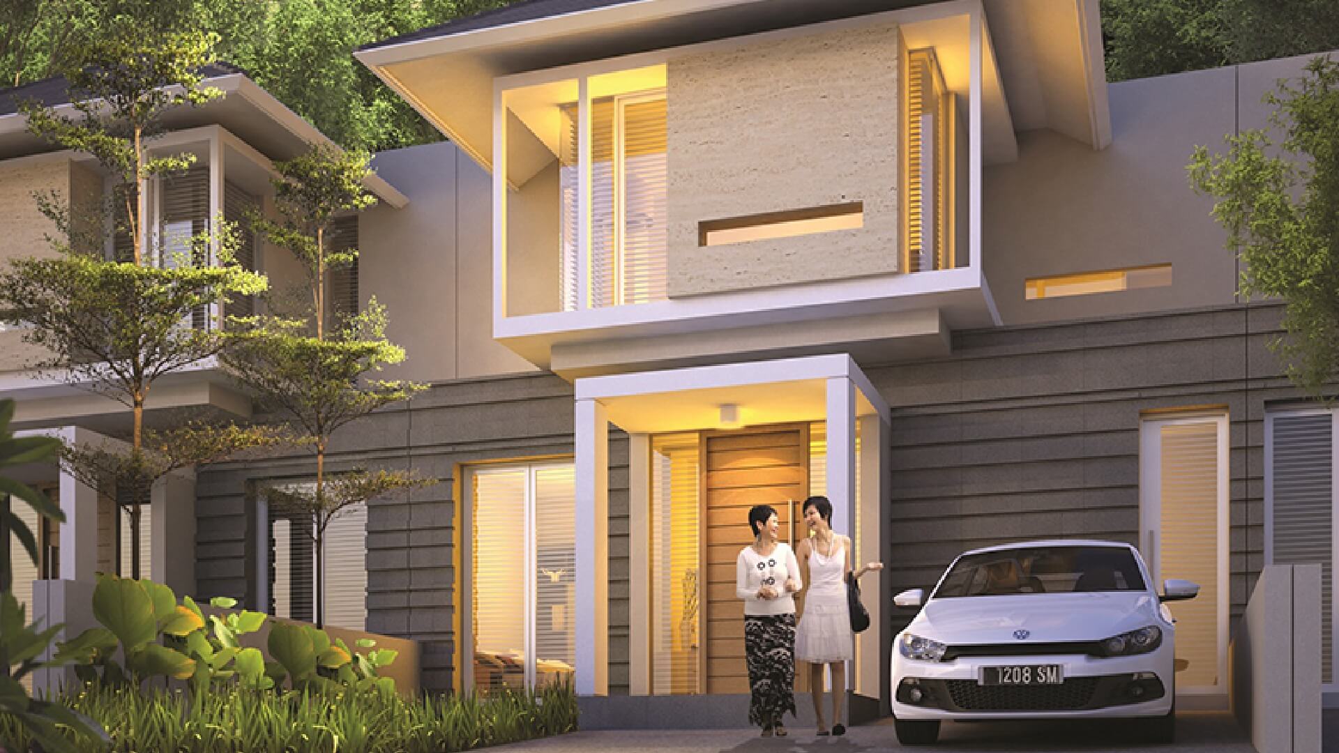 Two women stand at the entrance of a modern townhouse with a white car parked in the driveway.