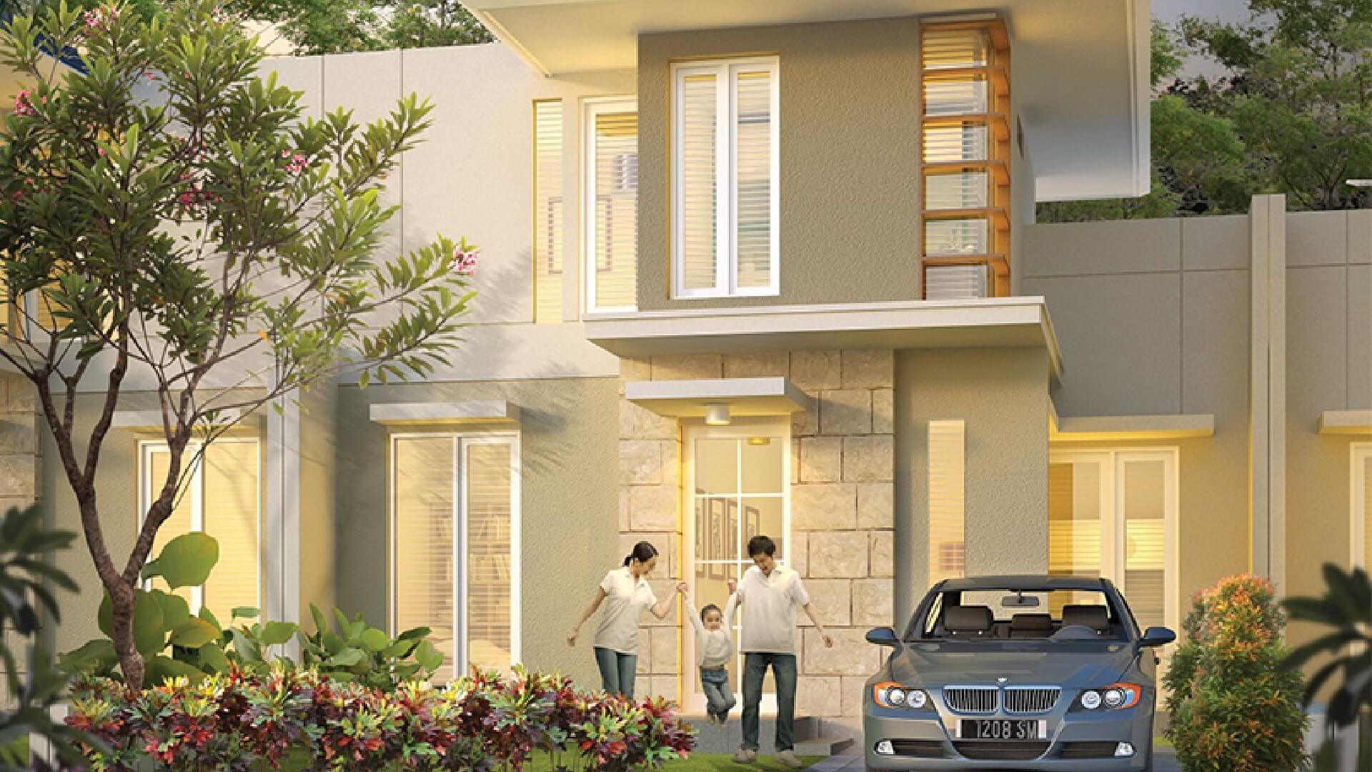Family of four standing at the entrance of a modern house with a blue SUV in the driveway and greenery in a sunny yard.